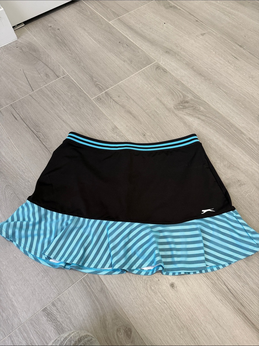 Slazenger Golf Black Skirt with Light Blue Striped Ruffle Hem